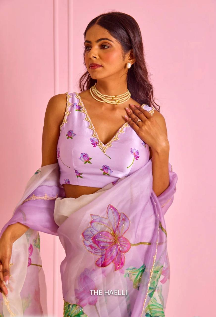 Women's Exquisite Lavender & White Organza Saree with Hand-Painted Lotus Floral Motifs & Gold Embellished Border – Complete with Matching Printed Blouse for Festive & Special Occasions